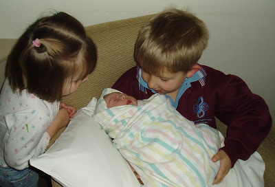 Amelia with her big brother and sister
