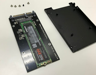 SSD mounted on mounting board in enclosure
