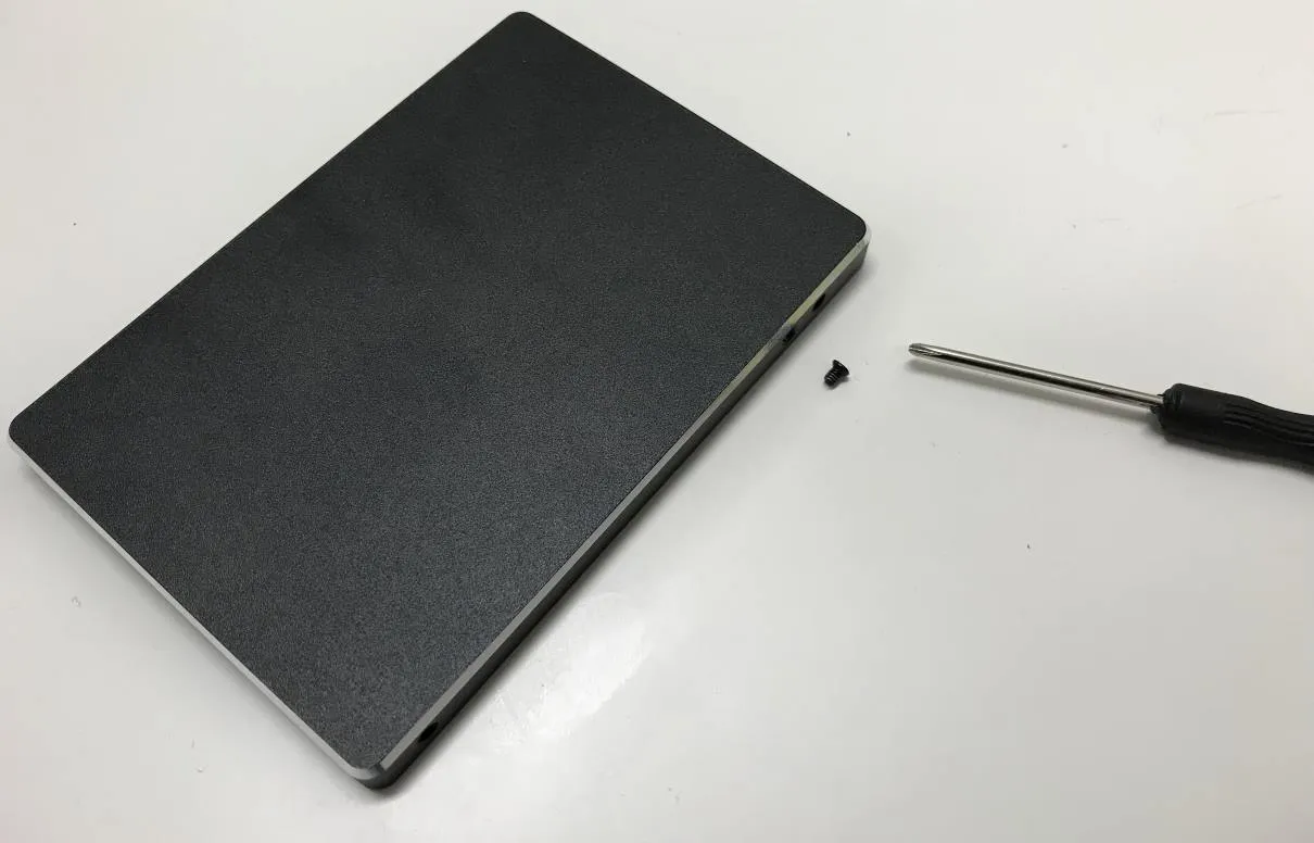 Enclosure, with side screw and screwdriver