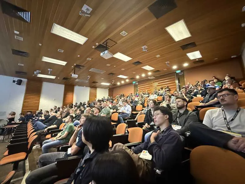 Attendees watching Ashley's talk