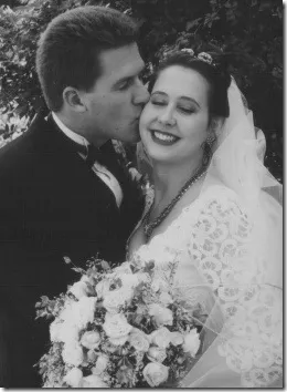 David kissing Narelle on their wedding day