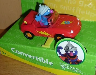Super Grover in his convertible car