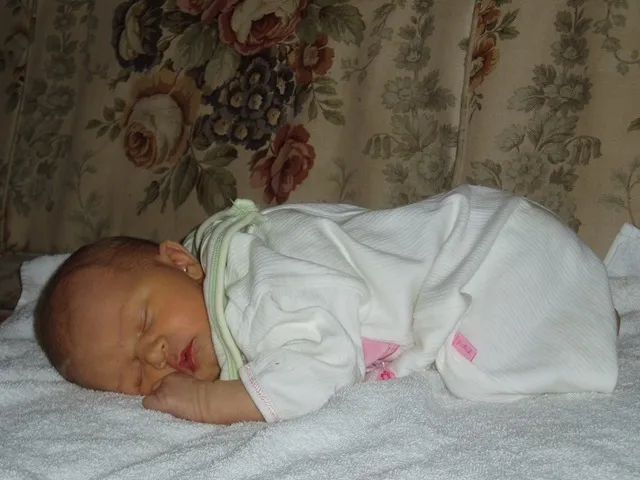 Amelia asleep on the couch