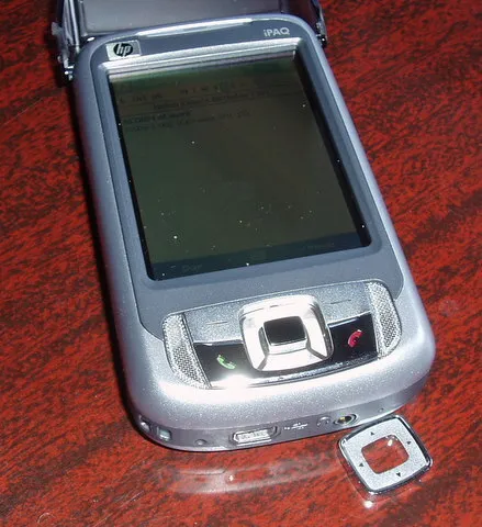 Photo of phone showing button separated