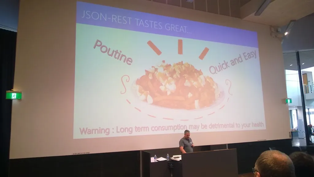 Darrel Miller presenting with photo of a Poutine