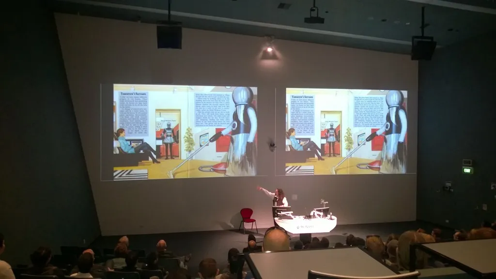 Paul Fenwick with slide of 1970&#x27;s sci fi robots