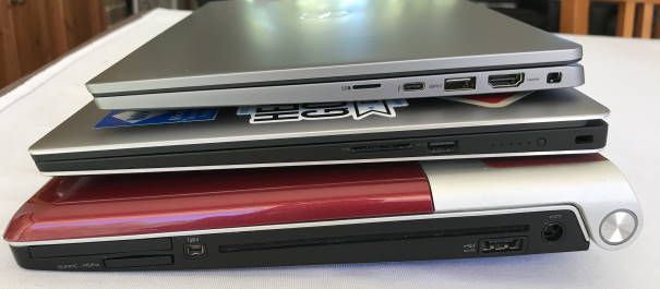 3 laptops stacked on top of each other