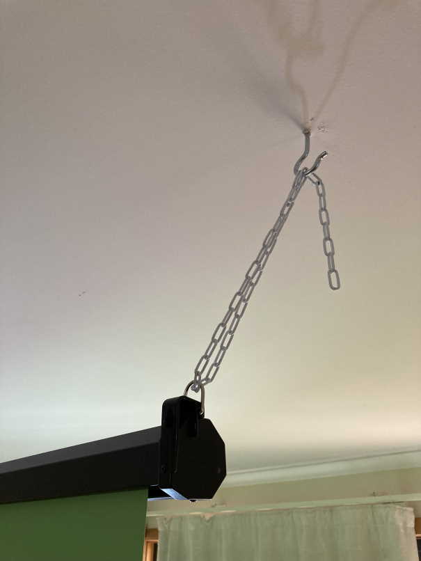 Closeup of ceiling hooks and chain