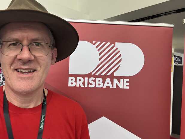 David next to the DDD Brisbane banner