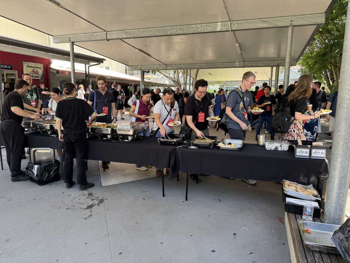 Attendees lining up to get lunch